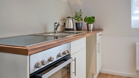 Alt trifft neu - Naturbalken und modernes Design